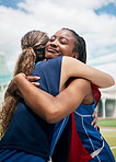 Sports, hug and women friends with teamwork, support and love for game, competition and training success in a park field. Netball, collaboration and team hugging for celebration, winning or thank you