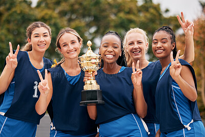 Buy stock photo Sports, netball and trophy with a woman team in celebration as a winner group of a victory or achievement. Peace, winning and teamwork with a female sport group celebrating success with a cup