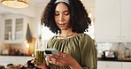 Woman, kitchen and smartphone with green smoothie on social media for posting. Female person, home and healthy diet or nutrition on internet or online for tips on vitamins, supplements or ingredients