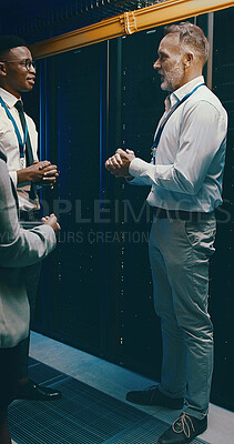 Buy stock photo Collaboration, cybersecurity and explain with people in server room for network administration. Communication, conversation and tech support with team in data center for maintenance of mainframe