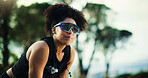 Exercise, thinking and tired with woman in forest for break, challenge or performance as runner. Fatigue, fitness and recovery with athlete person outdoor in nature for marathon, training or workout