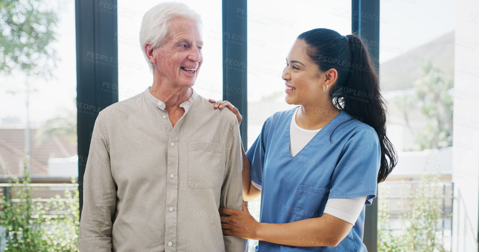 Buy stock photo Laughing, old man and caregiver in nursing home with funny story, conversation or wellness checkup. Smile, senior person or nurse in retirement center with joke, communication and healthcare support.