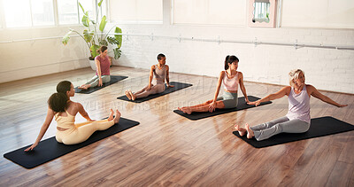 Buy stock photo Pilates class, instructor and women stretching in studio for wellness, morning exercise and flexibility. Yoga, personal trainer and group of people in health club for wellbeing, zen and workout