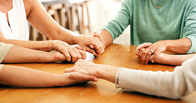 Buy stock photo Holding hands, home and women with support, friends and comfort with empathy, grief and prayer. Closeup, spiritual and mature people with sympathy, care and mourning for loss, religion and consoling