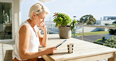 Buy stock photo Balcony, coffee and thinking with mature woman at apartment for break, decision or social media. Home, reading or relax and female person with beverage outdoor for fresh air, me time or planning