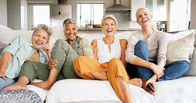 Buy stock photo Home, mature women and watching tv with laughing for comedy movie, weekend break or bonding. Relax, happy friends or streaming series together on sofa for holiday reunion, entertainment or funny show