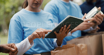 Buy stock photo Tablet, volunteer or hands in park for food drive, community service or packaging for charity event. Teamwork, local ngo and people with donation supply with digital checklist, paper bag and outdoor