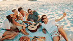 Smile, people and selfie for picnic on beach for photography, social media post and holiday. Happy, friends and profile picture update for travel memory, group gathering and bonding for ocean getaway