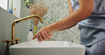 Buy stock photo Water, disinfection and woman washing hands in bathroom for removal of germs, dirt or bacteria. Sink, hygiene and female person with cleaning skin for health, wellness or virus safety routine in home