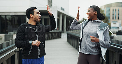 Buy stock photo Runner, couple and high five with smile in city for fitness progress, race training or teamwork. Interracial people, achievement or celebration for workout results, cardio pace and exercise goal