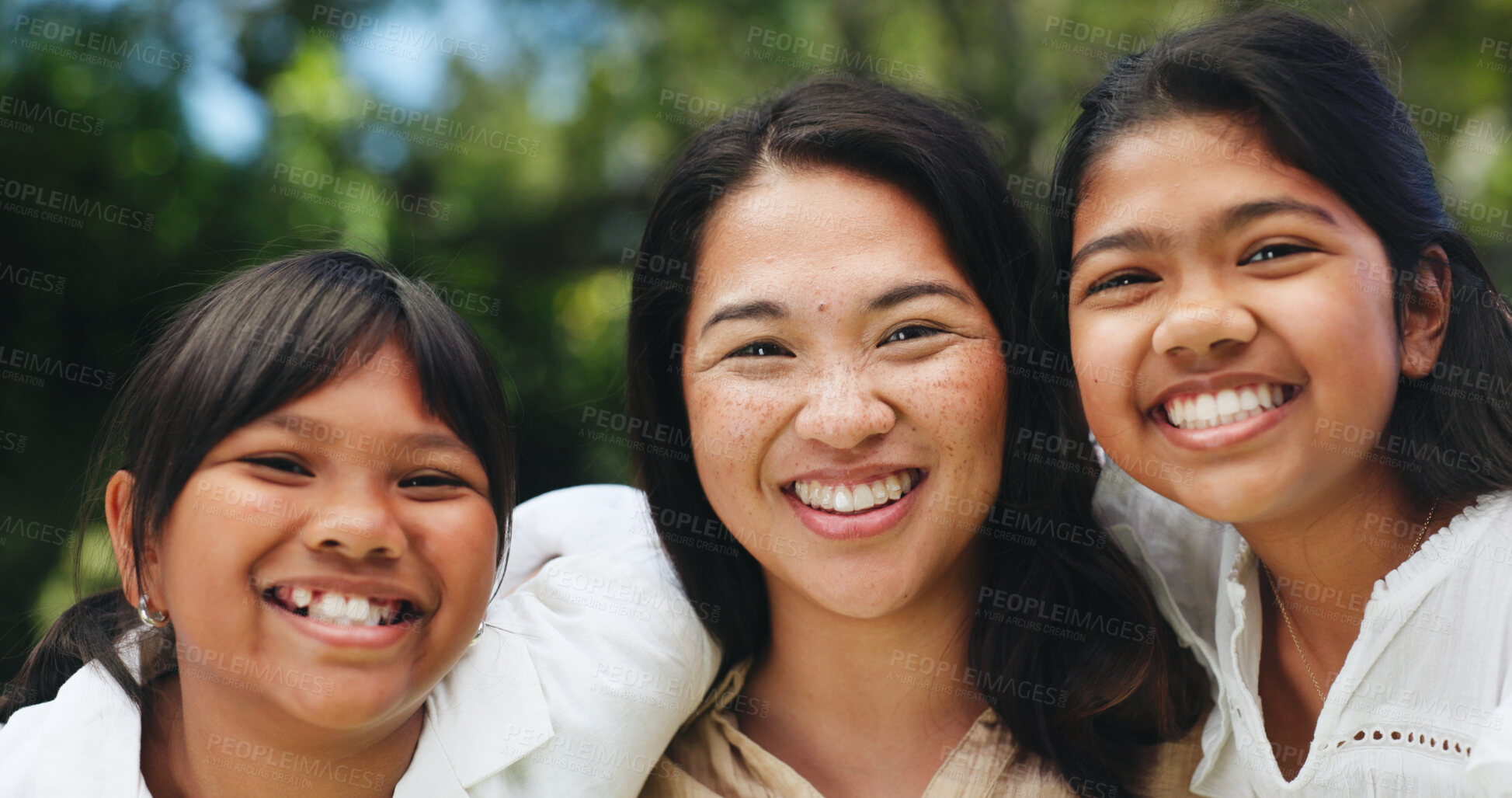 Buy stock photo Portrait, smile and mother with girls at park, outdoor bonding and family time to support relationship. Summer holiday, happiness or woman embrace with children in nature, care or love for connection