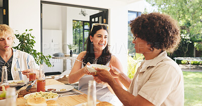 Buy stock photo Lunch, smile and help with friends outdoor for food, social reunion and summer vacation. Gathering, dining and party event with group of people eating in backyard of house for holiday and support