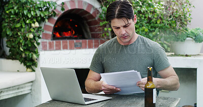 Buy stock photo Man, finance and laptop with documents in garden for expenses, mortgage bills or payments. Male person, reading and computer with paperwork or invoice for financial planning or budget checklist