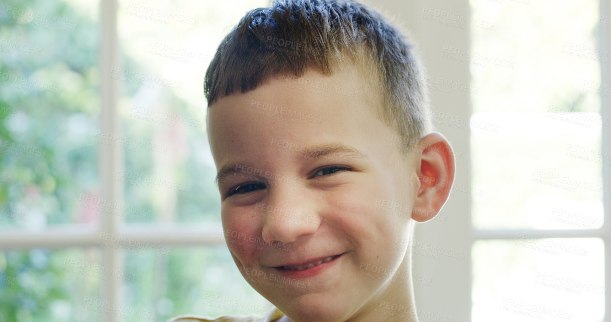 Buy stock photo Happy, growth and portrait with boy in home for child development, weekend break and relax. Smile, peace and childhood with male kid in living room of apartment for humor, calm and youth wellness