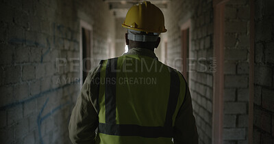 Buy stock photo Back, man and engineer walking at construction site for inspection, project manager and renovation. Male person, hardhat and employee for property development, building expansion and quality control