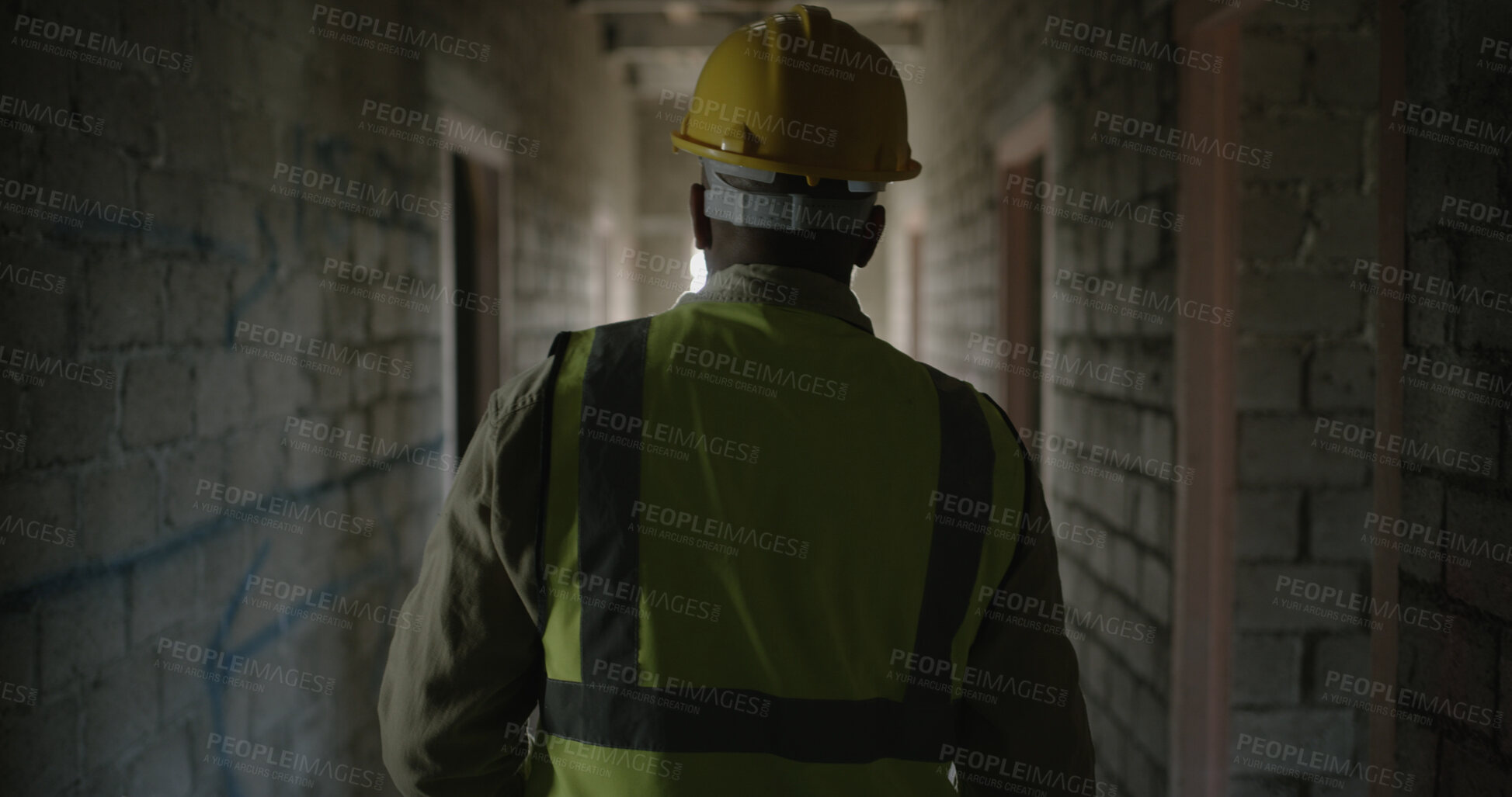 Buy stock photo Back, man and engineer walking at construction site for inspection, project manager and renovation. Male person, hardhat and employee for property development, building expansion and quality control
