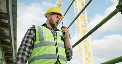 Buy stock photo Radio, discussion or supervisor outdoor for construction, plan or instruction in project management. Architecture, helmet or man with tech, infrastructure progress or communication in site inspection