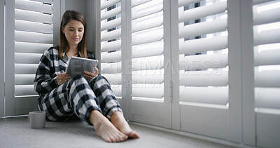 Buy stock photo Tablet, coffee and woman in bedroom in home with social media, networking or reading blog. Digital technology, research and female person with texting for communication on app in apartment on weekend