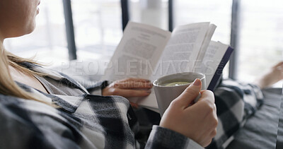 Buy stock photo Reading, book and hands with green tea, bedroom and resting with literature on break or comfortable. Chilling, reader and person with fiction story on bed, relax and peaceful with lemon drink in home