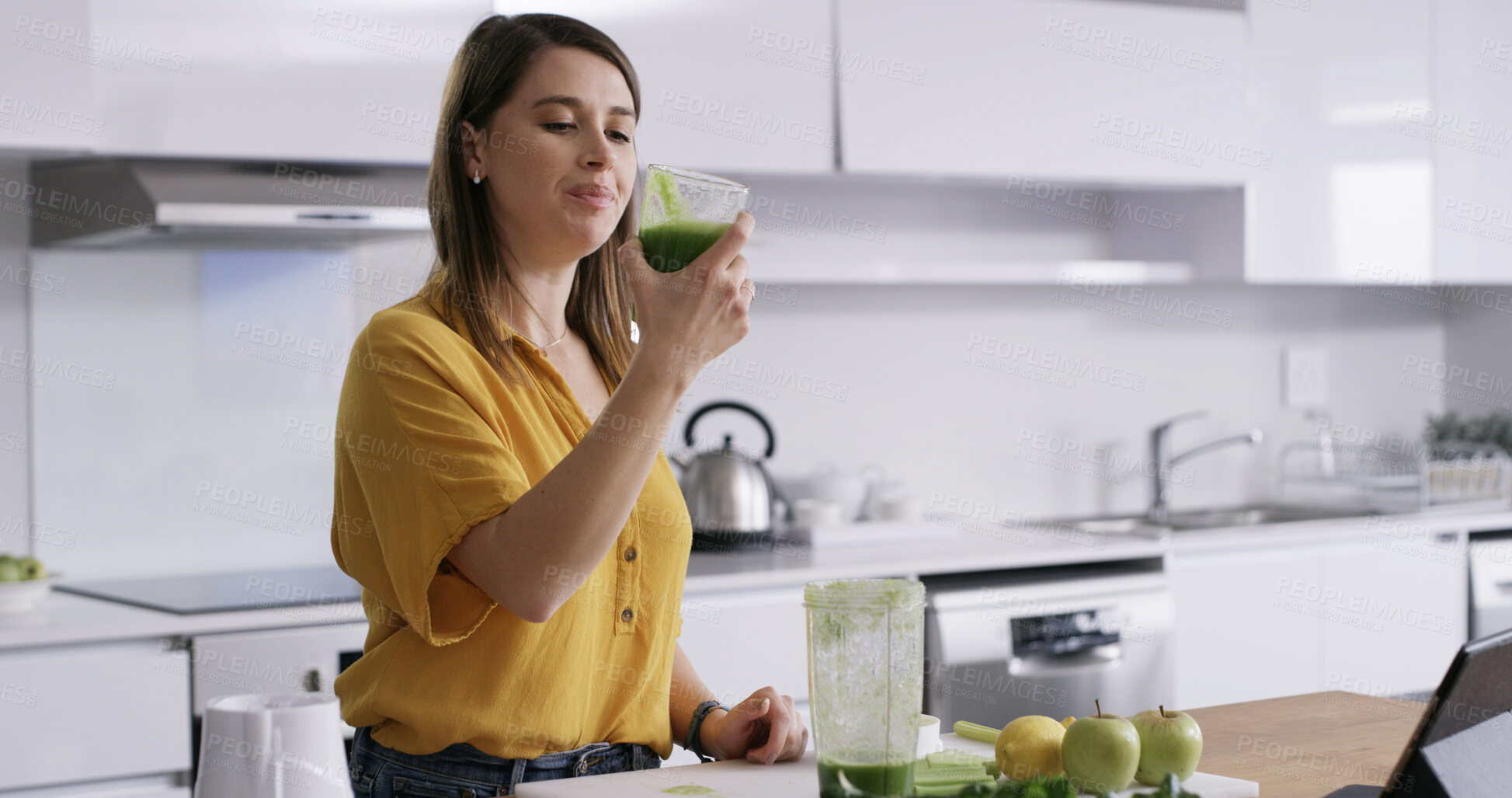 Buy stock photo Drink, woman and smile in home for breakfast, healthy diet and green fruit smoothie. Person, blender and technology in kitchen to prepare ingredients, meal prep or nutrition shake for weigh loss