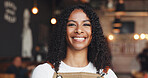 Waiter, portrait and woman in restaurant with smile, experience or pride as dining assistant. Hospitality, bokeh or server in cafe with confidence, profession and job goals in customer service.