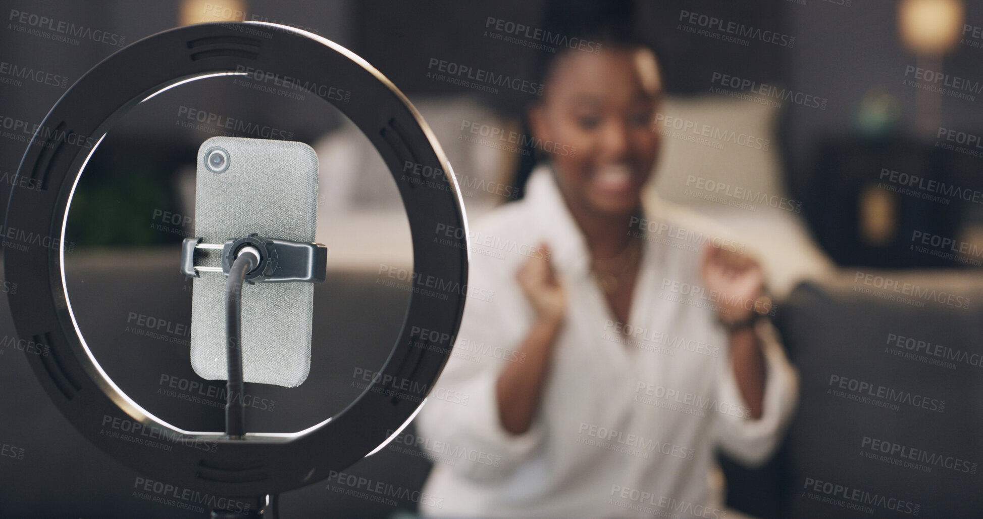Buy stock photo Phone, ring light and recording with influencer in home for content creation, post or video on web. Person, smartphone and production for social media, live streaming or app in lounge at apartment