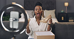 Influencer, talking and black woman with shoes for live streaming, product review and unboxing. Content creator, social media and person in bedroom with fashion opinion, feedback and ring light
