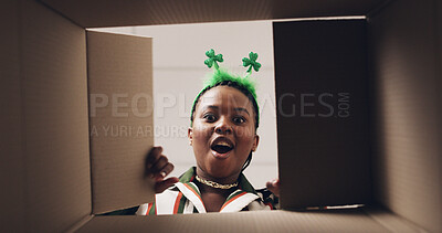 Buy stock photo Surprise, open and pov of black woman with box for present, gift and package for St Patricks day. Decoration, below and portrait of happy person with parcel for shock, wow and excited for celebration
