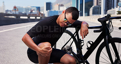 Buy stock photo Knee pain, cyclist and fitness with man in city for workout mistake, sports injury and fibromyalgia. Muscle sprain, inflammation and cycling with person and bike for training fatigue and issue