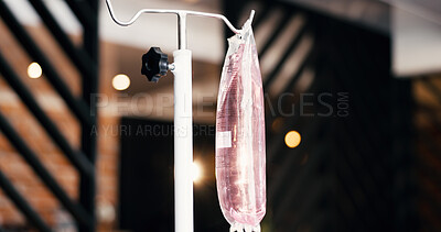 Buy stock photo Therapy, IV bag and drip in lounge for health benefits, saline solution and immune system boost. Bokeh, intravenous infusion and medical fluid at wellness center for nutrition, detox and electrolytes