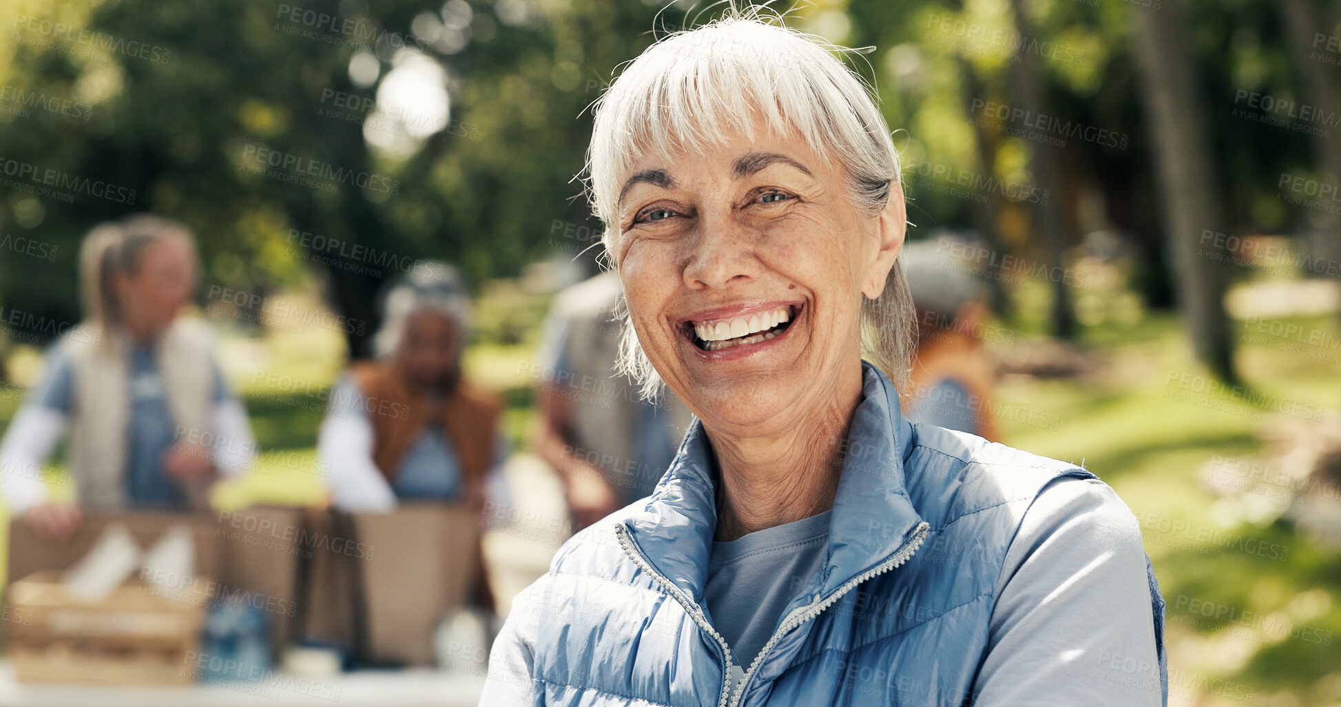 Buy stock photo Portrait, volunteer and woman with smile, outdoor and food donations and hope for community outreach. Pride, activist or mature person in park, NGO mission or charity aid for social responsibility