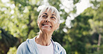 Fitness, smile or old woman in nature with thinking, fresh air or rest after physical activity. Wellness, bokeh or senior person in forest with mindfulness, daydreaming or break in retirement hobby.