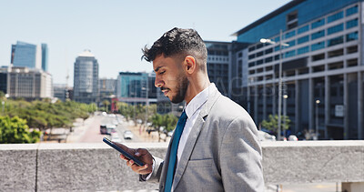 Buy stock photo Phone, reading and notification with businessman in city for communication, networking or travel. App, corporate person and direction with employee outdoor in urban town for morning commute schedule