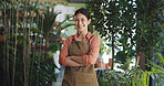Portrait, arms crossed and nursery with woman in store for plant growth specialist, ecommerce and entrepreneur. Environment, florist and small business with person for gardening expert and botany