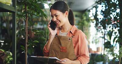 Buy stock photo Phone call, plant and clipboard with woman in nursery for sustainability, contact and botany checklist. Delivery confirmation, communication and garden inventory with person in store for discussion