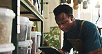 Soil, tablet and inspection with black man in nursery for quality control, botany specialist and entrepreneur. Small business, online inventory and fertilizer with person for eco friendly store