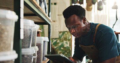 Buy stock photo Soil, tablet and inspection with black man in nursery for quality control, botany specialist and entrepreneur. Small business, online inventory and fertilizer with person for eco friendly store