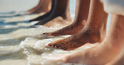 Buy stock photo Peace, water and feet of friends at beach for summer vacation, tropical adventure and calm. Travel destination, tourism and holiday with group of people in ocean outdoor for waves, sea and break