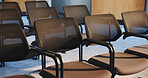 Chairs, seminar and empty room for business summit, event and convention or meeting venue. Furniture, hall and interior of conference center with rows for forum, presentation or seats for workshop