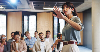 Buy stock photo Business woman, presentation and group at convention for corporate training, upskill workshop or conference. Mature female, audience and speaker with insight for professional development at seminar