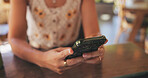 Woman, hands and phone and cafe for social media, networking and review restaurant online. Customer, mobile and connection in diner for rating service, digital menu and loyalty program application