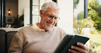 Buy stock photo Senior man, relax and tablet at house for social media, browsing website and morning news. Elderly person, happiness and digital for reading ebook, download games and app subscription in living room
