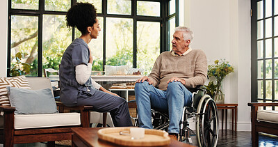 Buy stock photo Conversation, caregiver or old man with wheelchair in house, retirement help or kindness for health. Support, talking or assisted living nurse with senior person with disability, homecare and empathy