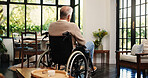 Old man, thinking and back in wheelchair, house and reflection with memory, rest and recovery. Elderly person with disability in living room, perspective or rehabilitation with injury in retirement