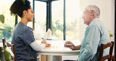 Buy stock photo Senior man, nurse and medication with water for healthcare or assisted living in retirement home. Happy caregiver, male person or diagnosis with medical pills for treatment or elderly care in house