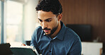 Reading, tablet and business man in office for finance review, investment and trading analyst. Professional, financial advisor and person on digital tech for stock market trends, research and profit