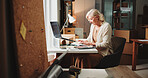 Ecommerce, woman and typing in small business with laptop for online order, process sales or shipping. Mature person, browsing and check email in workplace with computer, logistics and delivery info.