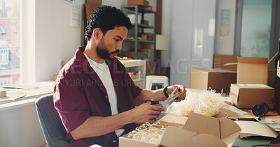 Buy stock photo Man, scissor and box at startup ecommerce for packaging, prepare shipping and customer details. Male person, cutting and label for package delivery, order information and quality control for dispatch