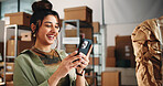 Ecommerce, woman and laugh in office with phone for funny email, customer feedback and text message. Logistics person, smile and scroll in workplace with tech for online chat, internet joke or humor.