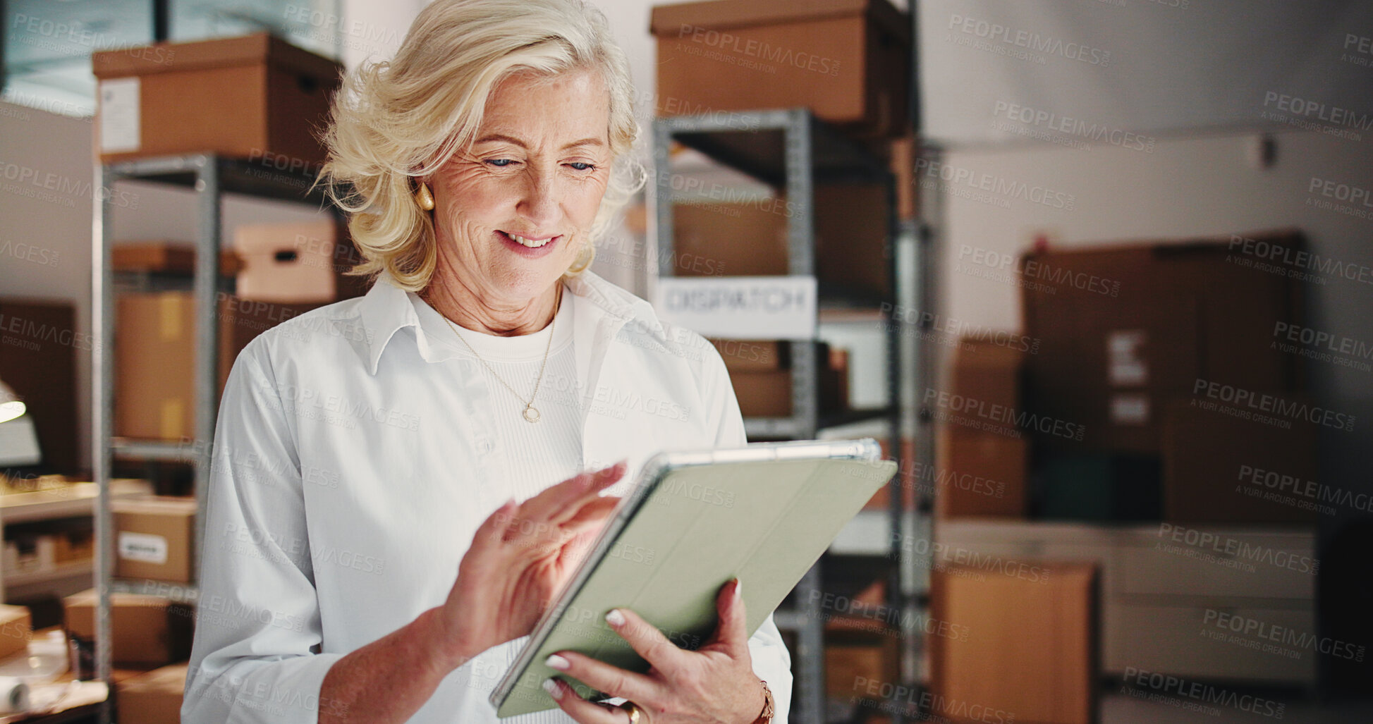 Buy stock photo Ecommerce, woman or reading on tablet in warehouse, check product sales or digital inventory management. Supplier website, startup or mature entrepreneur with dropshipping order, tech or stock admin